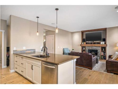 18 Masters Mews Se, Calgary, AB - Indoor With Fireplace