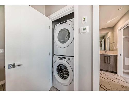 3414-111 Wolf Creek Drive Se, Calgary, AB - Indoor Photo Showing Laundry Room