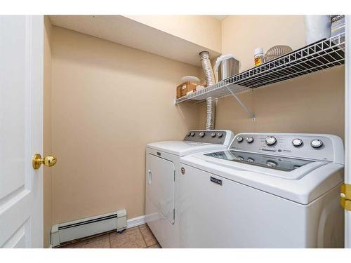 107-1401 Centre A Street Ne, Calgary, AB - Indoor Photo Showing Laundry Room