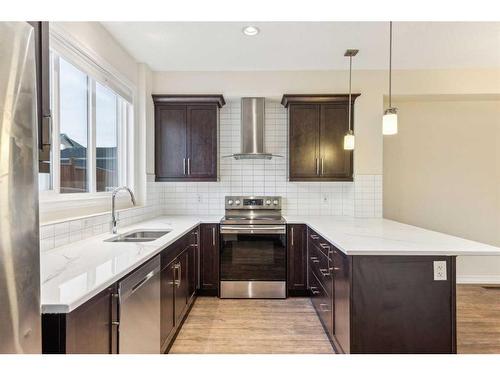 27 Carringvue Drive Nw, Calgary, AB - Indoor Photo Showing Kitchen With Double Sink With Upgraded Kitchen