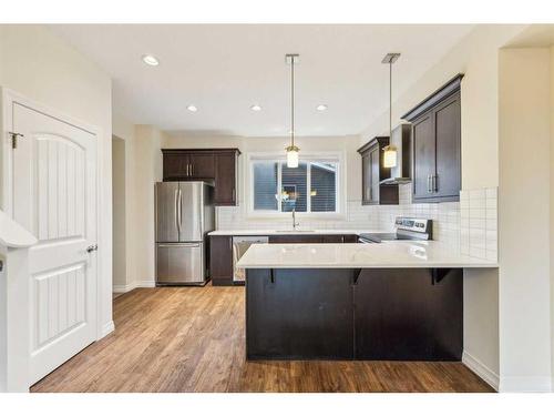 27 Carringvue Drive Nw, Calgary, AB - Indoor Photo Showing Kitchen With Stainless Steel Kitchen With Upgraded Kitchen