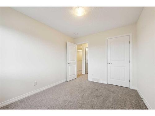 27 Carringvue Drive Nw, Calgary, AB - Indoor Photo Showing Other Room