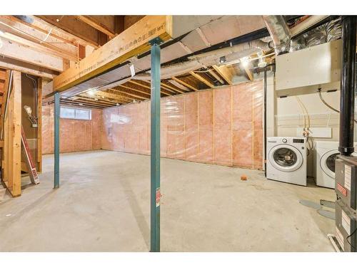 27 Carringvue Drive Nw, Calgary, AB - Indoor Photo Showing Basement