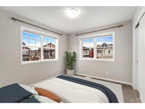 137 Osborne Common Sw, Airdrie, AB - Indoor Photo Showing Bedroom