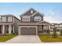 137 Osborne Common Sw, Airdrie, AB  - Outdoor With Deck Patio Veranda With Facade 