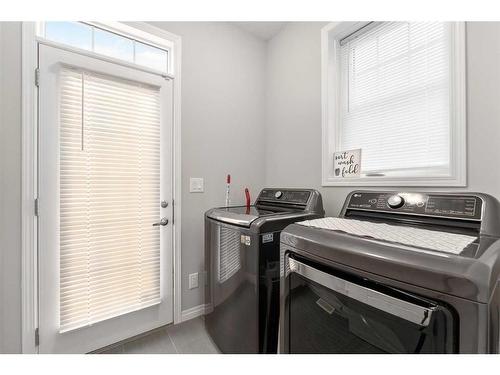 137 Osborne Common Sw, Airdrie, AB - Indoor Photo Showing Laundry Room