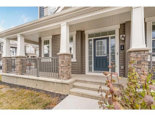 137 Osborne Common Sw, Airdrie, AB - Outdoor With Deck Patio Veranda With Facade