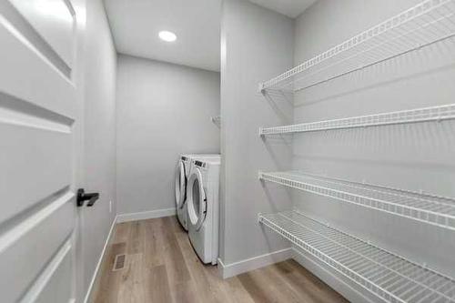 1026 Fowler Road, Airdrie, AB - Indoor Photo Showing Laundry Room