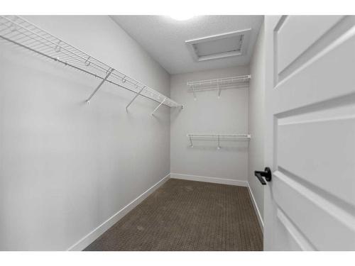 1026 Fowler Road, Airdrie, AB - Indoor With Storage