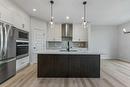 1026 Fowler Road, Airdrie, AB  - Indoor Photo Showing Kitchen With Upgraded Kitchen 