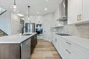 1026 Fowler Road, Airdrie, AB  - Indoor Photo Showing Kitchen With Upgraded Kitchen 