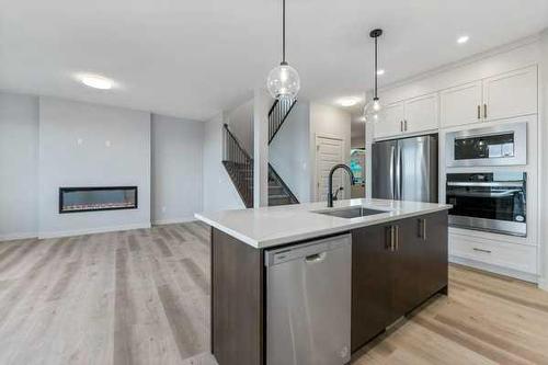 1026 Fowler Road, Airdrie, AB - Indoor Photo Showing Kitchen With Upgraded Kitchen