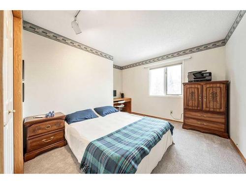 2256 Douglasbank Crescent Se, Calgary, AB - Indoor Photo Showing Bedroom