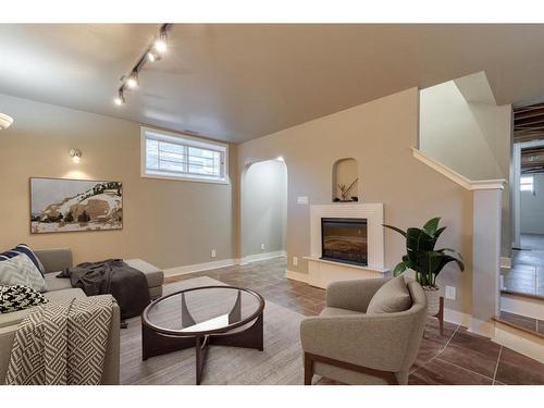 205 19 Avenue Nw, Calgary, AB - Indoor Photo Showing Living Room With Fireplace