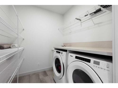 232 Cranbrook Point Se, Calgary, AB - Indoor Photo Showing Laundry Room