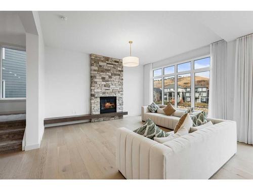 232 Cranbrook Point Se, Calgary, AB - Indoor Photo Showing Living Room With Fireplace