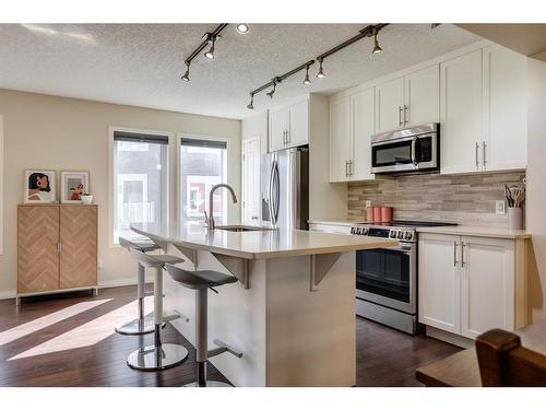 203 Auburn Meadows Se, Calgary, AB - Indoor Photo Showing Kitchen With Stainless Steel Kitchen With Upgraded Kitchen