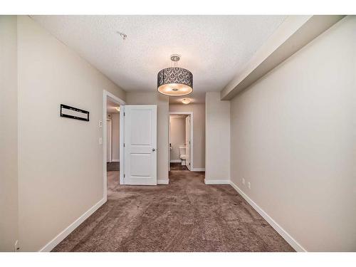 1113-625 Glenbow Drive, Cochrane, AB - Indoor Photo Showing Other Room