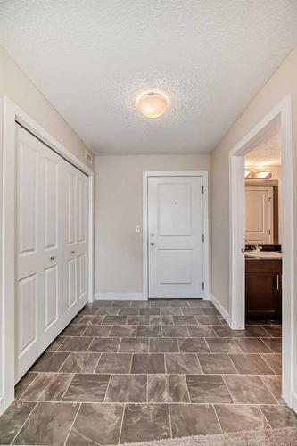 1113-625 Glenbow Drive, Cochrane, AB - Indoor Photo Showing Other Room