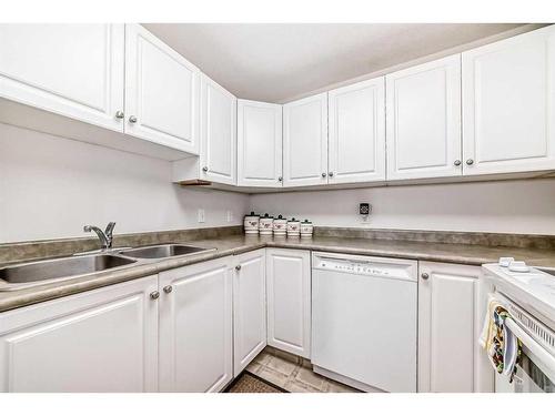 334-5000 Somervale Court Sw, Calgary, AB - Indoor Photo Showing Kitchen With Double Sink