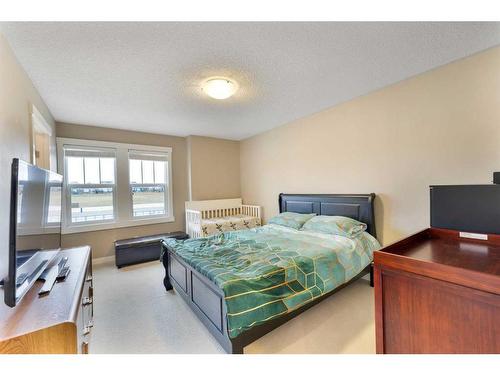 115 Fireside Parkway, Cochrane, AB - Indoor Photo Showing Bedroom