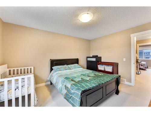 115 Fireside Parkway, Cochrane, AB - Indoor Photo Showing Bedroom