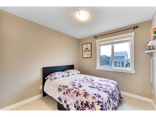 115 Fireside Parkway, Cochrane, AB - Indoor Photo Showing Bedroom