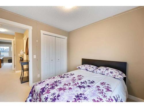 115 Fireside Parkway, Cochrane, AB - Indoor Photo Showing Bedroom