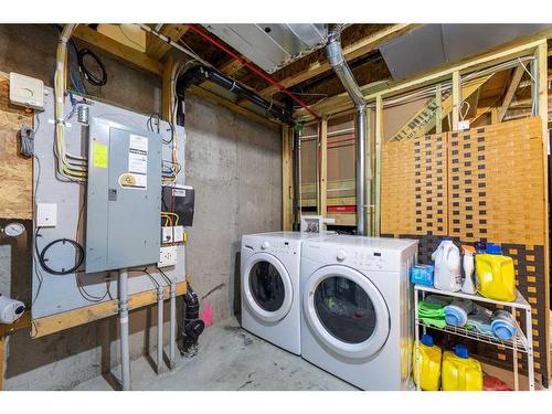 115 Fireside Parkway, Cochrane, AB - Indoor Photo Showing Laundry Room