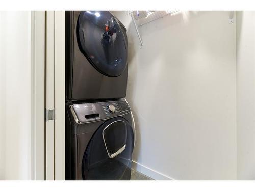 92 Walden Lane Se, Calgary, AB - Indoor Photo Showing Laundry Room