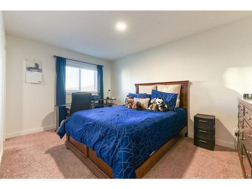 92 Walden Lane Se, Calgary, AB - Indoor Photo Showing Bedroom