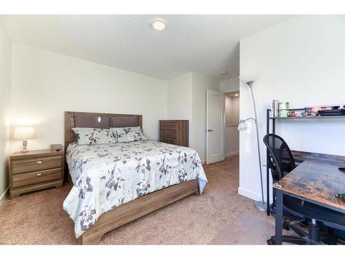 92 Walden Lane Se, Calgary, AB - Indoor Photo Showing Bedroom