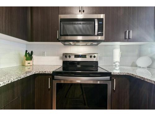 92 Walden Lane Se, Calgary, AB - Indoor Photo Showing Kitchen With Upgraded Kitchen