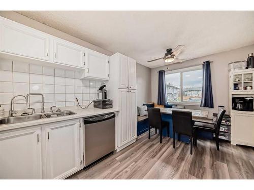 46-6020 Temple Drive Ne, Calgary, AB - Indoor Photo Showing Kitchen With Double Sink