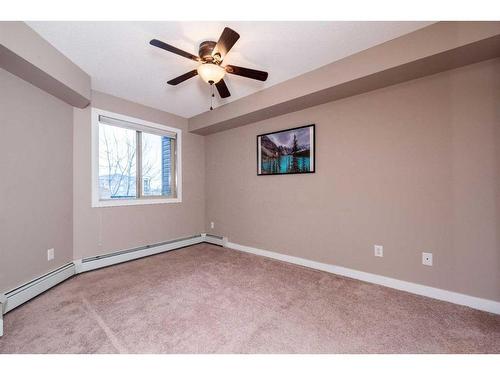 320-7180 80 Avenue Ne, Calgary, AB - Indoor Photo Showing Other Room