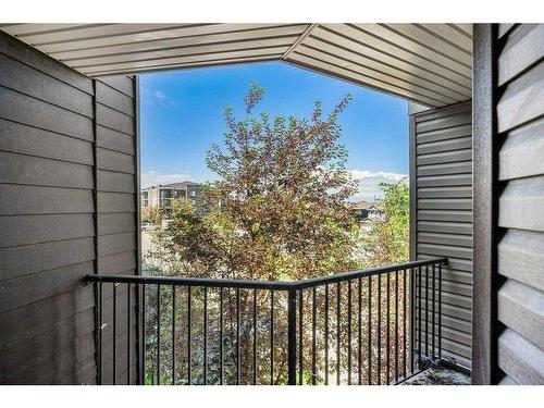 320-7180 80 Avenue Ne, Calgary, AB - Outdoor With Balcony With Exterior