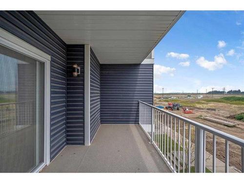 605-33 Merganser Drive, Chestermere, AB - Outdoor With Exterior