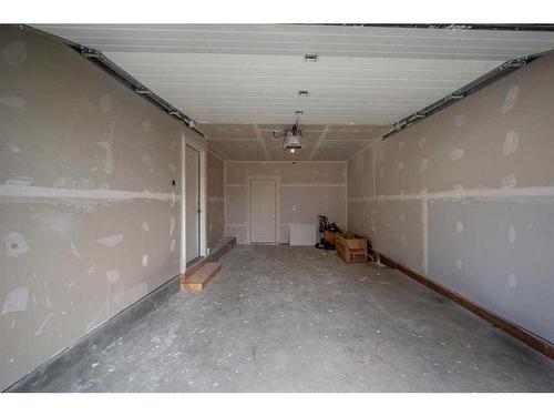 605-33 Merganser Drive, Chestermere, AB - Indoor Photo Showing Garage