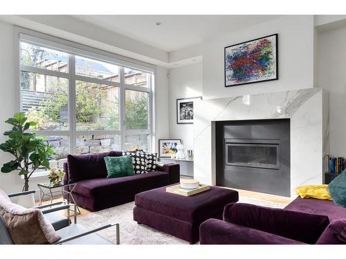 511 Salem Avenue Sw, Calgary, AB - Indoor Photo Showing Living Room With Fireplace