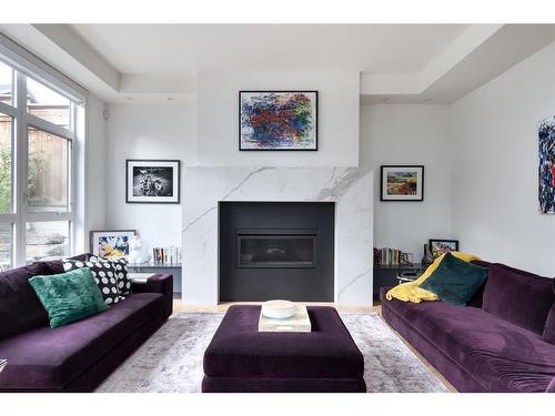 511 Salem Avenue Sw, Calgary, AB - Indoor Photo Showing Living Room With Fireplace