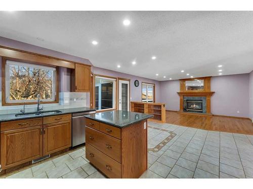 281 Westchester Green, Chestermere, AB - Indoor With Fireplace