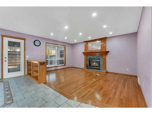 281 Westchester Green, Chestermere, AB - Indoor Photo Showing Other Room With Fireplace