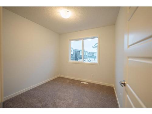 531-137 Red Embers Link Ne, Calgary, AB - Indoor Photo Showing Other Room