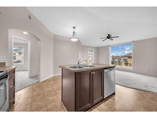 201-30 Panatella Landing Nw, Calgary, AB - Indoor Photo Showing Kitchen With Double Sink