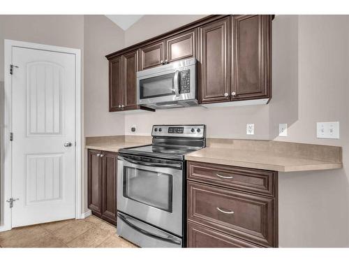 201-30 Panatella Landing Nw, Calgary, AB - Indoor Photo Showing Kitchen