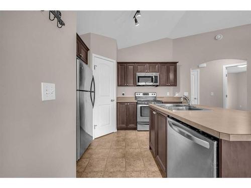 201-30 Panatella Landing Nw, Calgary, AB - Indoor Photo Showing Kitchen With Double Sink