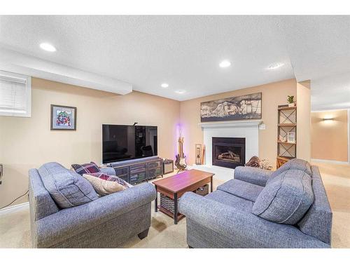 40 River Rock Circle Se, Calgary, AB - Indoor With Fireplace