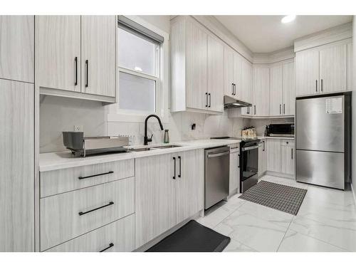 40 Waterford Terrace, Chestermere, AB - Indoor Photo Showing Kitchen With Double Sink