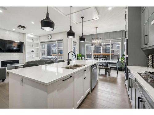 40 Waterford Terrace, Chestermere, AB - Indoor Photo Showing Kitchen With Double Sink With Upgraded Kitchen