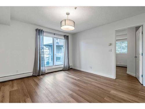 116-92 Saddletree Court Ne, Calgary, AB - Indoor Photo Showing Other Room